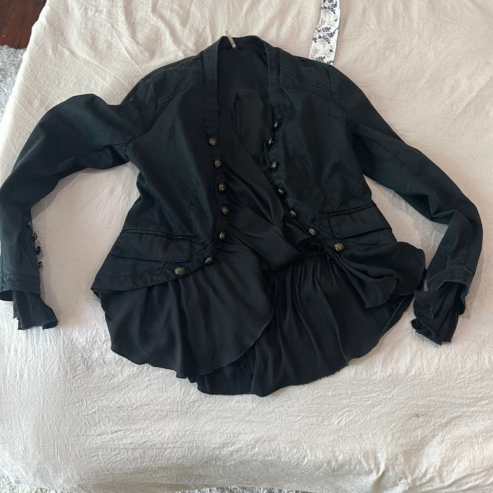 Free people black ruffles romance jacket. Never worn. On website for full price.